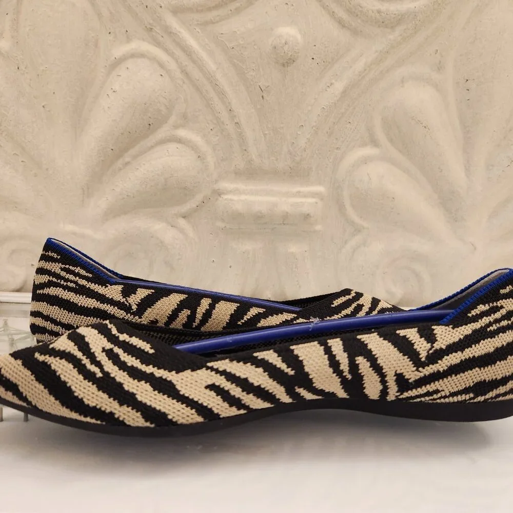 Rothy's Black/Cream Zebra Point toe flats. NWT. Size 6